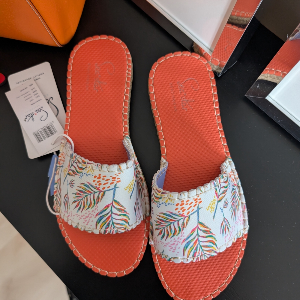 Vibrant Orange Sandals with Tropical Design